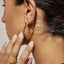 ARMS OF EVE SEBASTIAN GOLD HOOP EARRINGS